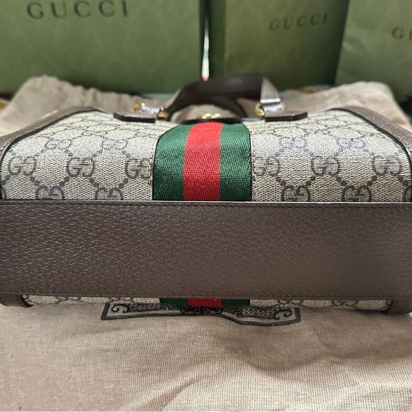 Authentic Gucci bag. Used a couple of times. Some makeup marks no damage. - Picture 6 of 6